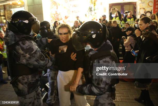 Russian Police officers detain detain a female protester during an unsanctioned protest rally at Arbat street on September 21 in Moscow, Russia. More...