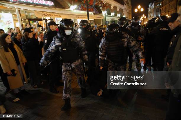 Russian Police officers detain detain a protester during an unsanctioned protest rally at Arbat street on September 21 in Moscow, Russia. More than...