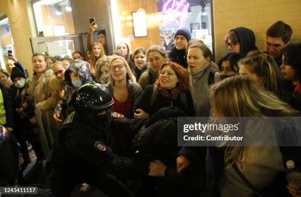 Russian Police officers detain detain a protester during an unsanctioned protest rally at Arbat street on September 21 in Moscow, Russia. More than...