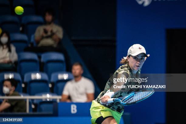 Fernanda Contreras Gomez of Mexico hits a return against Veronika Kudermetova of Russia during their women's singles match on day four of the Pan...