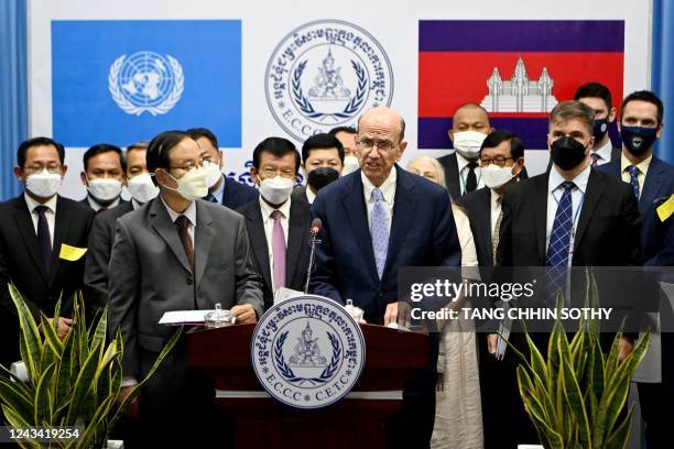 Assistant Secretary-General for Legal Affairs of the United Nations Stephen Mathias speaks as Bin Chhin , Cambodia's deputy prime minister and...