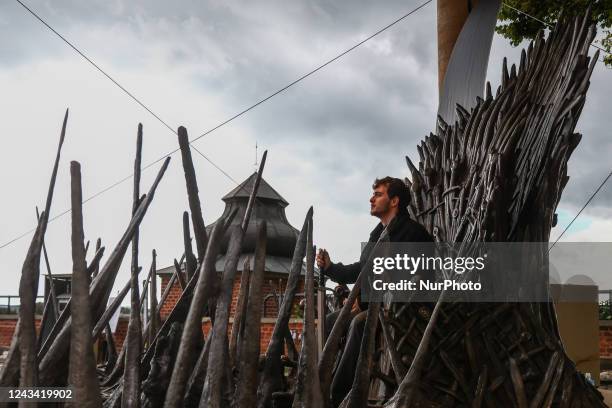 Visitors are taking a sit on the Iron Throne located at Wawel Castle as part of promo campaign of 'House of the Dragon', the new HBO prequel to 'Game...