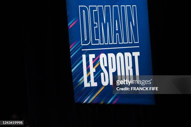 Photograph taken on September 22, 2022 shows the logo of the debate event dubbed "Demain le sport" , in Paris on September 22, 2022. - The swimming...