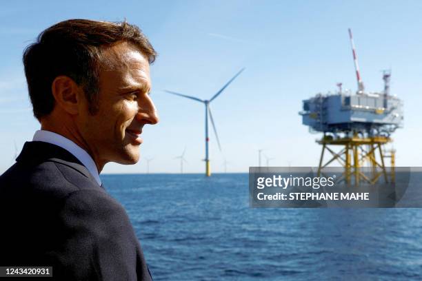 French President Emmanuel Macron visits the Saint-Nazaire offshore wind farm, off the coast of the Guerande peninsula in western France, on September...