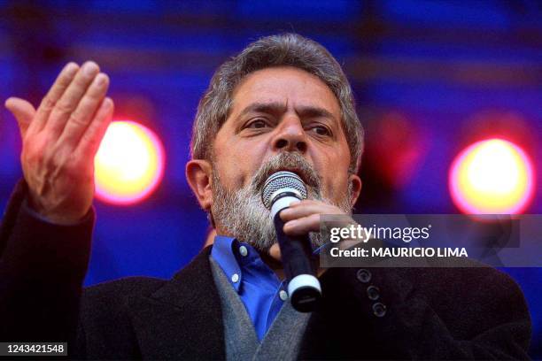 Luis Inacio Lula da Silva, presidential candidate for Brazil's Labor Party, gives a speech 21 July 2002, at the Primero de Mayo stadium in Sao Paulo,...