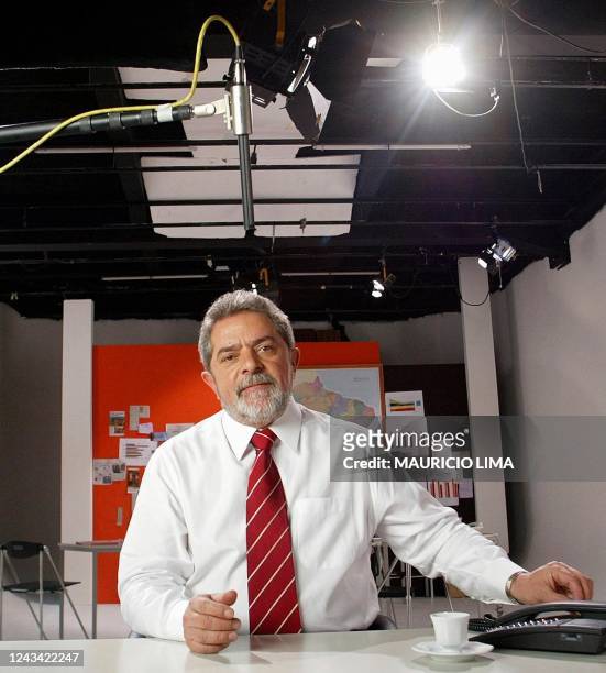 Brazilian presidential candidate of the Workers Party Luiz Inacio Lula da Silva pauses during a taping of a television advertisement for his...