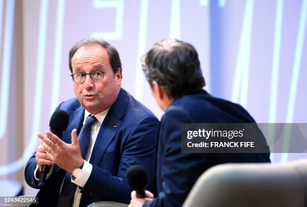 Former French president Francois Hollande participates in a debate on the occasion of an event dubbed "Demain le sport" , in Paris on September 22,...