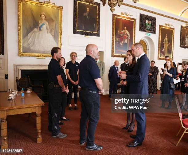 Prince William, Prince of Wales and Catherine, Princess of Wales visit the Windsor Guildhall to thank volunteers and operational staff involved in...