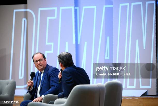 Former French president Francois Hollande participates in a debate on the occasion of an event dubbed "Demain le sport" , in Paris on September 22,...