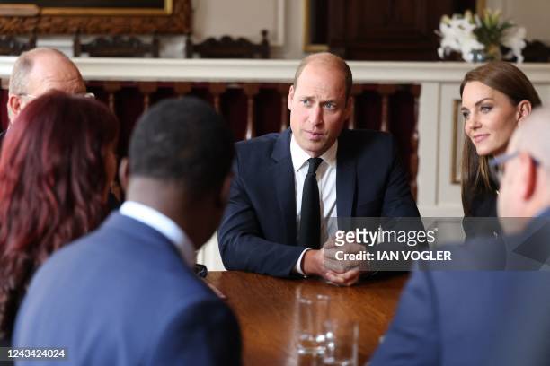 Britain's Prince William , Prince of Wales, and Britain's Catherine, Princess of Wales, visit the Guildhall in Windsor on September 22, 2022 to thank...
