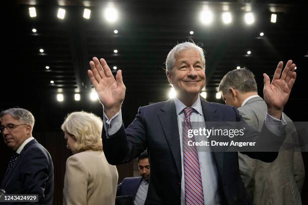 JPMorgan Chase & Co CEO Jamie Dimon gestures as he arrives for a Senate Banking, Housing, and Urban Affairs Committee hearing on Capitol Hill...