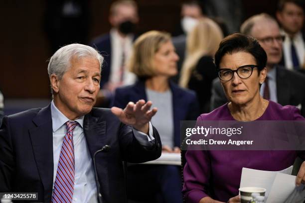 JPMorgan Chase & Co CEO Jamie Dimon and Citigroup CEO Jane Fraser talk as they arrive for a Senate Banking, Housing, and Urban Affairs Committee...