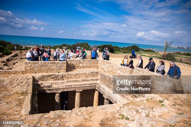 Tourists visit the Archeologic site of the Tombs of the Kings in Paphos, Cyprus on March 5, 2022.