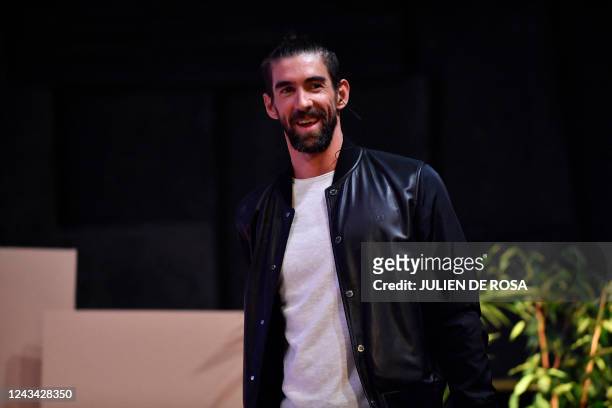 Former US Swimmer and Olympic champion Michael Phelps arrives to participate in a debate on the occasion of an event dubbed "Demain le sport" , in...