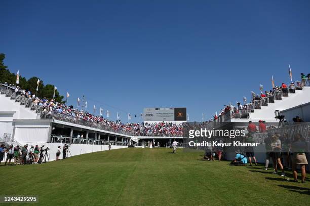 Fans watch the Opening Ceremony and Trophy presentation on the first tee during the first round of Presidents Cup at Quail Hollow September 22 in...