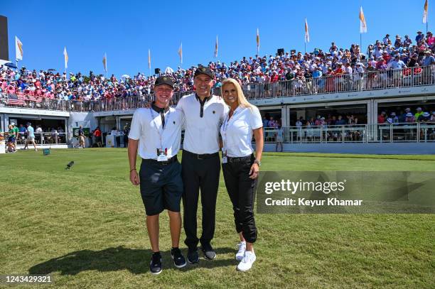 International Team Captain Trevor Immelman of South Africa, his wife Carminita Immelman and son pose for a photo at the Opening Ceremony and Trophy...