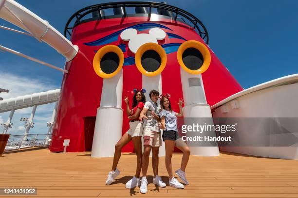 In this handout photo provided by Disney Cruise Lines, Chandler Kinney, Pearce Joza and Ariel Martin from Disney Channel’s “Zombies 3” set sail on...