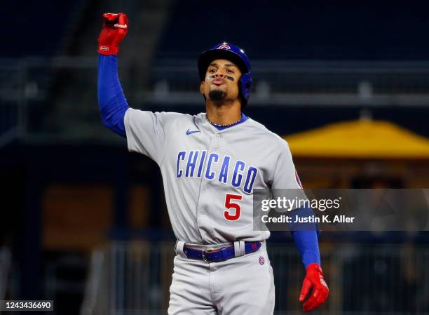 Christopher Morel of the Chicago Cubs reacts after hitting a two RBI double in the second inning against the Pittsburgh Pirates during the game at...