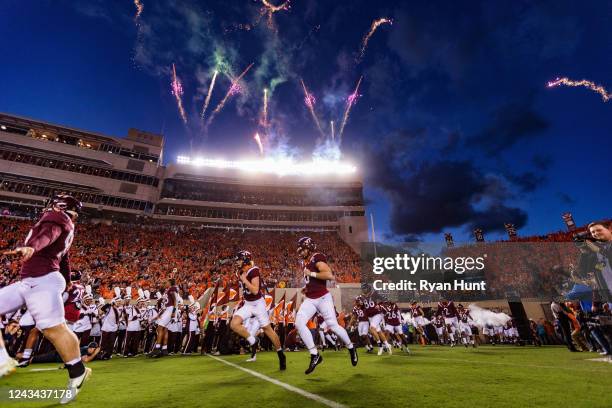 The Virginia Tech Hokies take the field before the start of their game against the West Virginia Mountaineers at Lane Stadium on September 22, 2022...