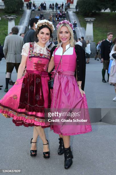 Viktoria Lauterbach and dirndl fashion designer Kinga Mathe during the Madlwiesn as part of the Oktoberfest at Schützenfestzelt on September 22, 2022...