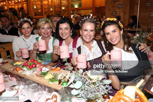 Judith Dommermuth, Julia Klöckner, Dorothee Bär, Monica Ivancan and her sister Miriam Mack during the Madlwiesn as part of the Oktoberfest at...