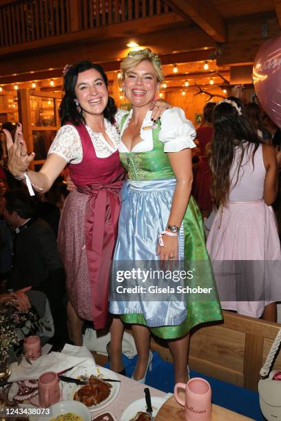 Dorothee Bär and Julia Klöckner during the Madlwiesn as part of the Oktoberfest at Schützenfestzelt on September 22, 2022 in Munich, Germany.