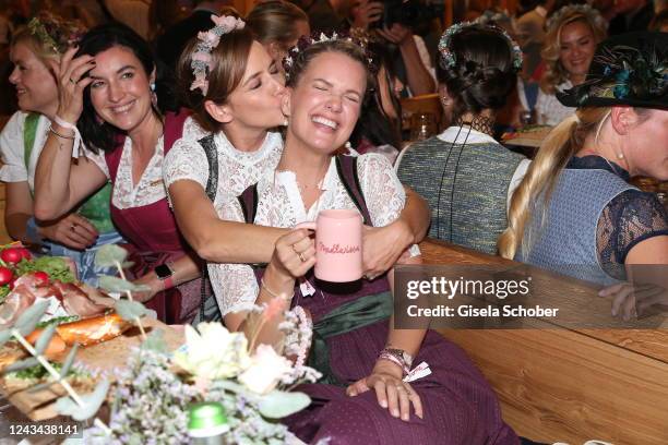 Dorothee Bär, Judith Dommermuth, Monica Ivancan during the Madlwiesn as part of the Oktoberfest at Schützenfestzelt on September 22, 2022 in Munich,...