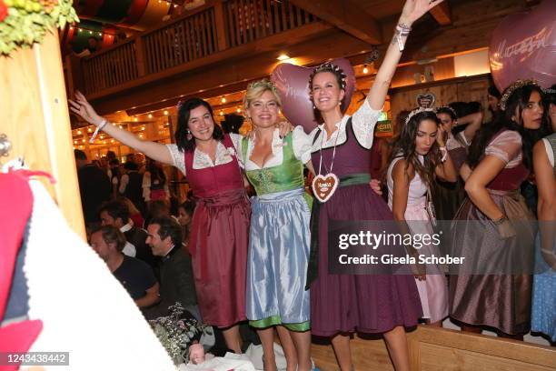 Dorothee Bär , Julia Klöckner and Monica Ivancan during the Madlwiesn as part of the Oktoberfest at Schützenfestzelt on September 22, 2022 in Munich,...