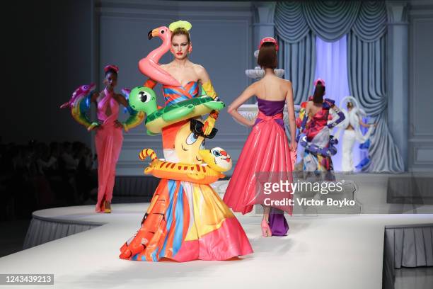 Models walk the runway of the Moschino fashion show during the Milan Fashion Week Womenswear Spring/Summer 2023 on September 22, 2022 in Milan, Italy.