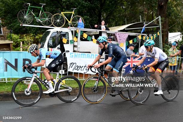 Riders compete in the junior men's road race cycling event at the UCI 2022 Road World Championship in Wollongong on September 23, 2022. - junior...