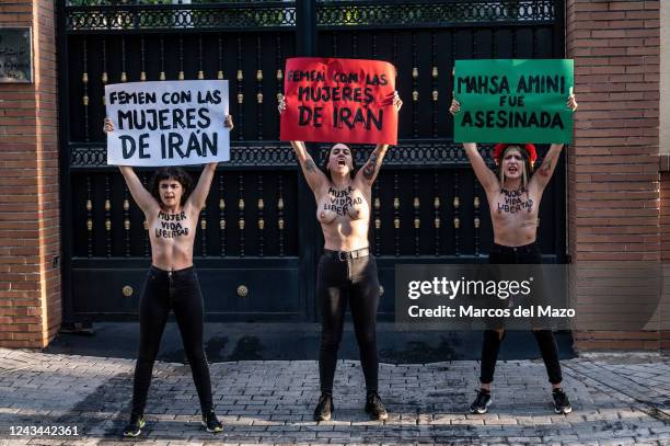 Activists of feminist group FEMEN protesting bare-chested outside of the Embassy of Iran against the death of Iranian woman Mahsa Amini. Mahsa Amini...