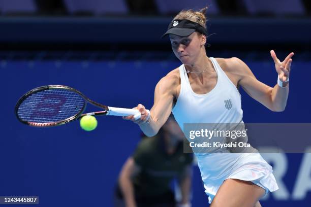 Ludmilla Samsonova of Russia plays a forehand in the Singles quarterfinal match against Garbine Muguruza of Spain during day five of the Toray Pan...