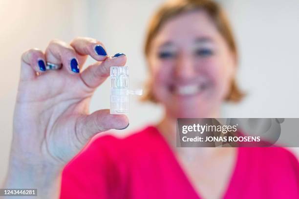 Vanessa Vankerckhoven, co-founder of Idevax, holding the applicator developed by Idevax, a Belgian startup that developed a more efficient vaccine...