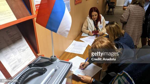 Residents cast their votes in controversial referendums in the city of Dokuchaievsk, Donetsk Oblast, Ukraine on September 23, 2022. Voting will run...
