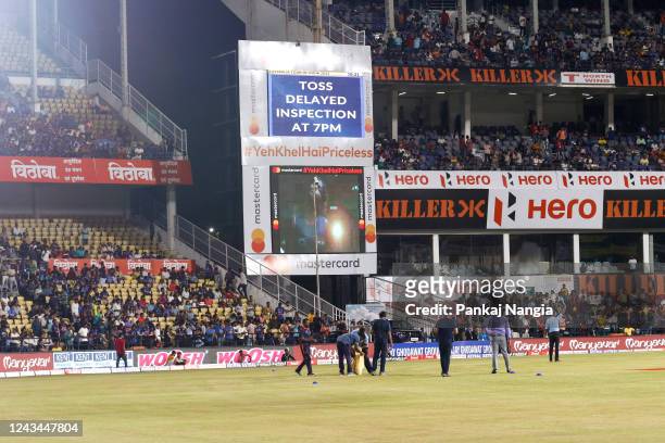 Grounds crew work as toss is delayed due to a wet outfield prior to game two of the T20 International series between India and Australia at Vidarbha...