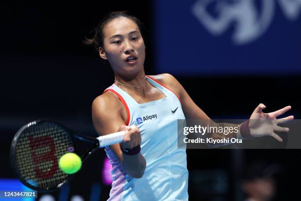 Zheng Qinwen of China plays a forehand in the Singles quarterfinal match against Claire Liu of the United States during day five of the Toray Pan...