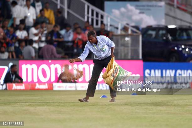 Grounds crew work as toss is delayed due to a wet outfield prior to game two of the T20 International series between India and Australia at Vidarbha...