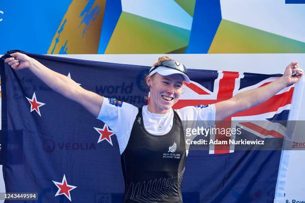 Jackie Kiddle of New Zealand celebrates her bronze medal in Lightweight Women's Single Sculls Final A during 2022 World Rowing Championships on...