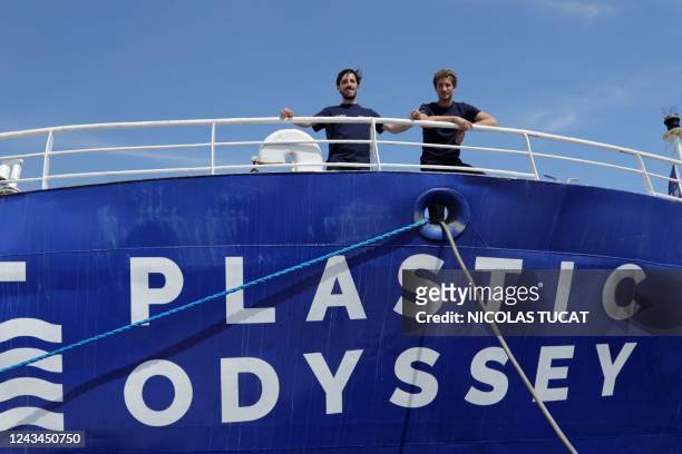 French merchant navy officer and CCO of Plastic Odyssey Alexandre Dechelote and French merchant navy officer, co-founder and CEO Simon Bernard pose...