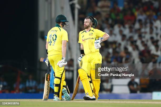 Matthew Wade and Steve Smith of Australia interact during game two of the T20 International series between India and Australia at Vidarbha Cricket...