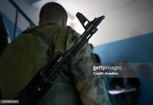 Residents cast their votes in controversial referendums in Donetsk Oblast, Ukraine on September 23, 2022. Voting will run from Friday to Tuesday in...