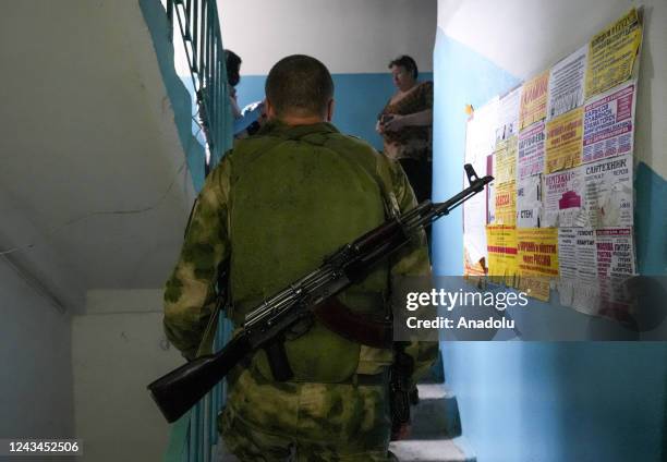 Residents cast their votes in controversial referendums in Donetsk Oblast, Ukraine on September 23, 2022. Voting will run from Friday to Tuesday in...