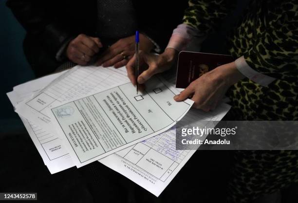 Residents cast their votes in controversial referendums in Donetsk Oblast, Ukraine on September 23, 2022. Voting will run from Friday to Tuesday in...