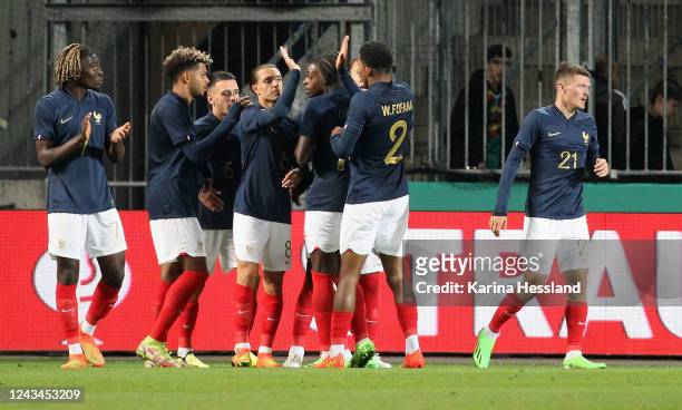 Amine Gouiri of France celebrates the opening goal with teammates during the International Friendly between Germany U21 and France U21 at MDCC Arena...