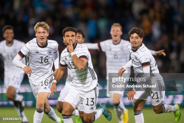 Lasse Rosenboom , Kerim Calhanoglu and Ben Justus Bobzien of Germany celebrate after scoring on a goal during the International Friendly U20 Germany...