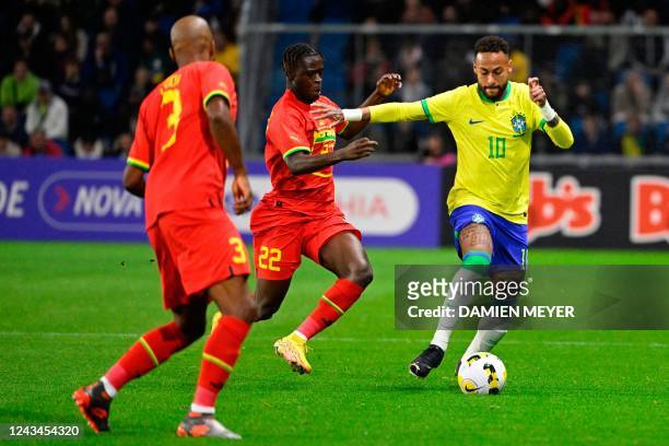 Brazil's Neymar Jr vies with Ghana's forward Kamaldeen Sulemana during the friendly football match between Brazil and Ghana at the Oceane Stadium in...