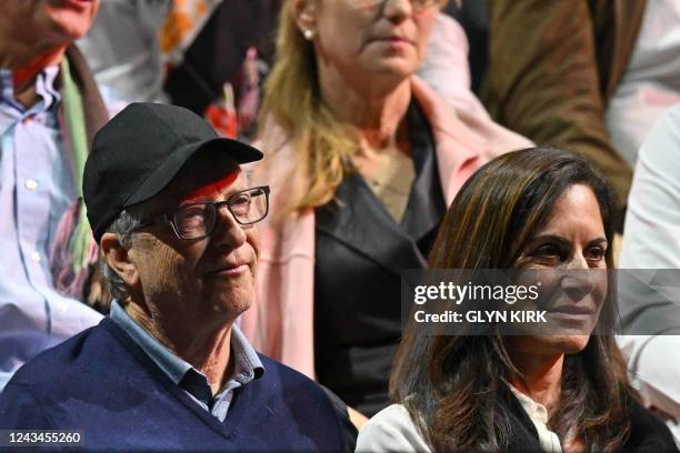 In the crowd, US philanthropist Bill Gates and his former wife Melinda, watch the game between Britain's Andy Murray of Team Europe and Australia's...
