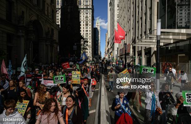 Climate activists march during a rally organized by youth climate awareness group Fridays for Future to declare a climate justice emergency, in New...