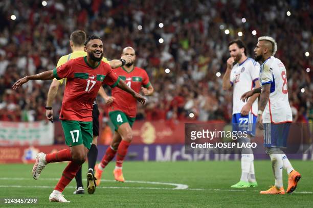 Morocco's forward Sofiane Boufal celebrates scoring the opening goal during the international friendly football match between Chile and Morocco at...
