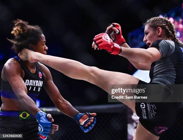 Dublin , Ireland - 23 September 2022; Leah McCourt, right, in action against Dayana Silva during their women's featherweight bout during Bellator 285...